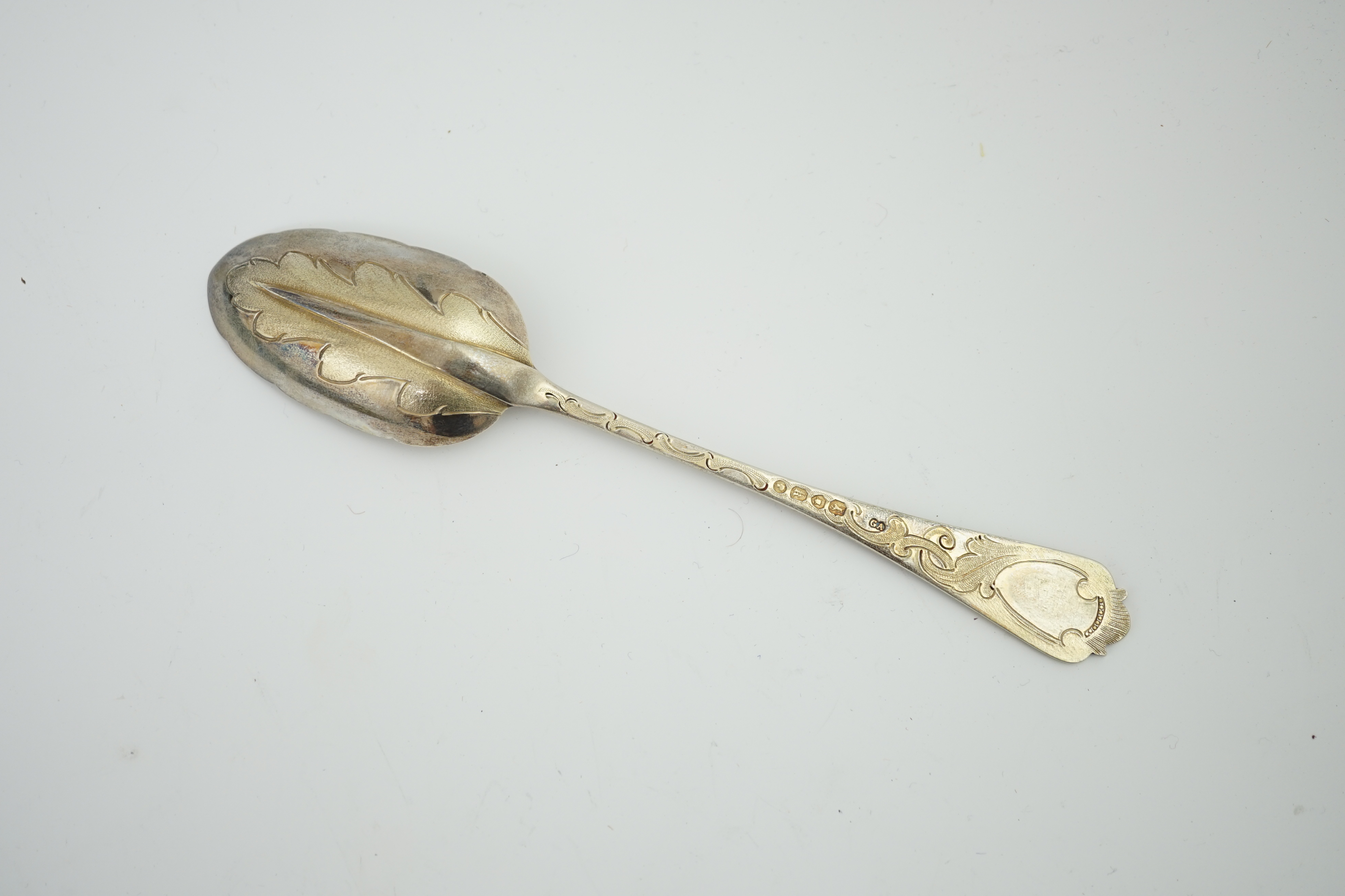 A Victorian cased set of six engraved silver dessert spoons and two serving spoons, by George Adams